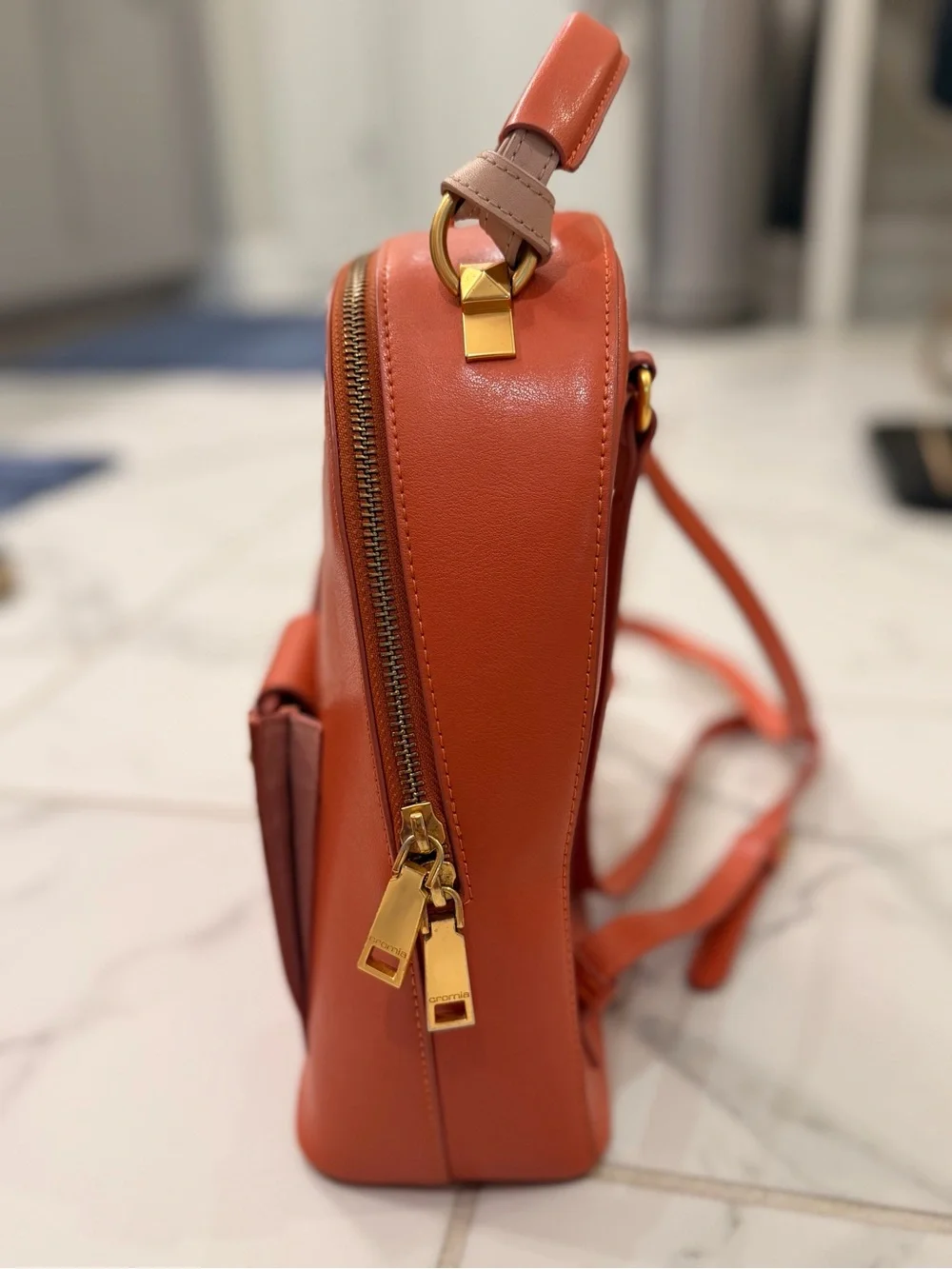 Cromia Elegant Orange Women's Backpack with Gold Hardware